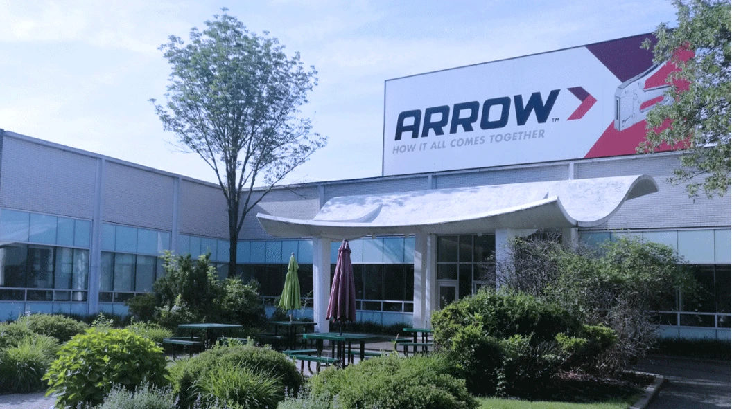 WORKPRO Arrow facility in the United States with a large branded sign above the entrance and landscaped shrubs WORKPRO Arrow facility in the United States with a large branded sign above the entrance and landscaped shrubs