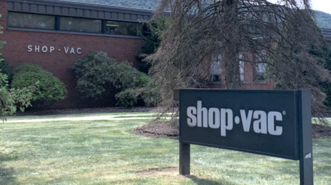 WORKPRO Shop-Vac facility in the United States with a brick facade, a lawn and a prominent sign beside trees WORKPRO Shop-Vac facility in the United States with a brick facade, a lawn and a prominent sign beside trees