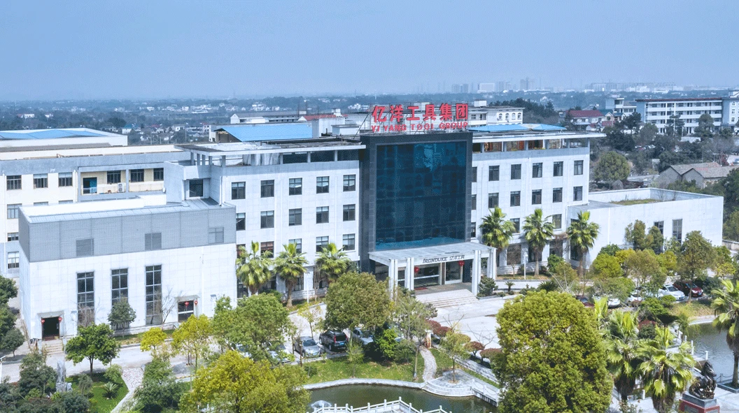 WORKPRO GreatStar facility in China with a white office building, a central glass entrance and landscaped gardens WORKPRO GreatStar facility in China with a white office building, a central glass entrance and landscaped gardens