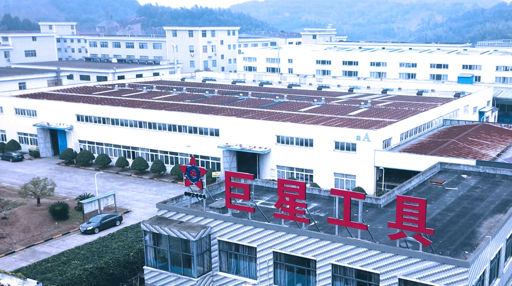 WORKPRO GreatStar factory complex in China with white production buildings and large red Chinese signage WORKPRO GreatStar factory complex in China with white production buildings and large red Chinese signage