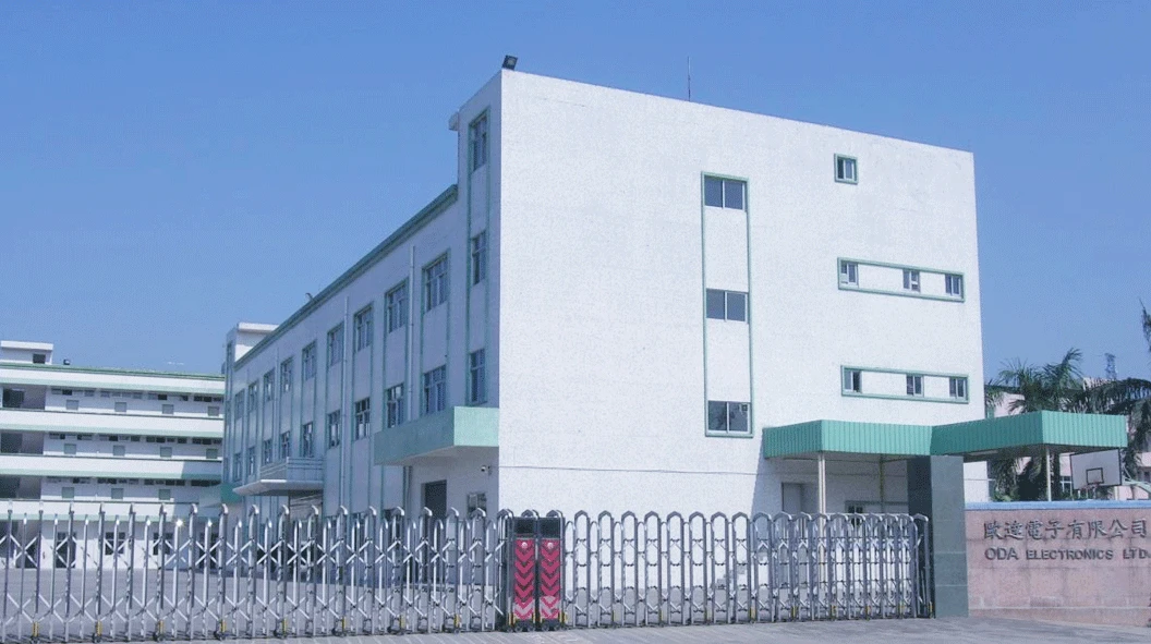 WORKPRO laser facility in China with a white multistory building, a green entrance canopy and a metal gate WORKPRO laser facility in China with a white multistory building, a green entrance canopy and a metal gate